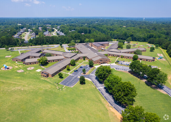 Carrollton Elementary School has a large campus with green landscapes.