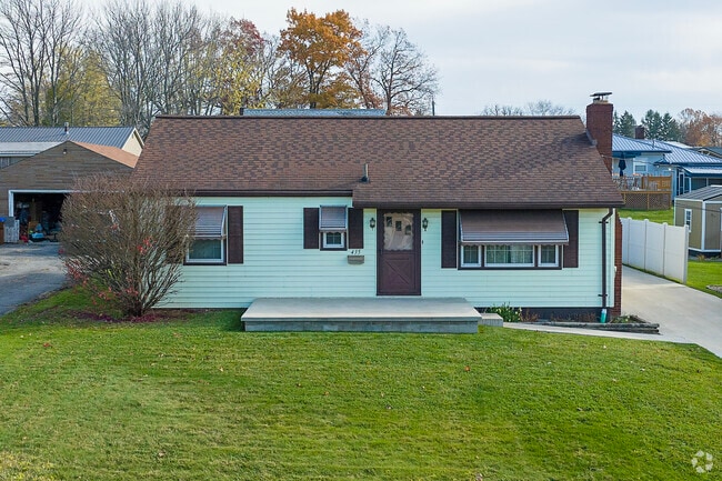 Ranch style home with a tidy lawn in Farrell.