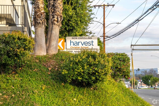 The entrance of Harvest Christian School proudly showcases its name on a prominent signage.