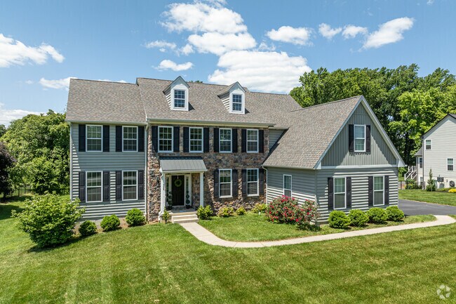 A large colonial home occupies a very large lot near Penn State's Brandywine campus in Lima.