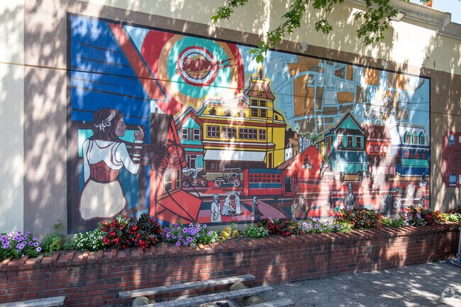 A mural is visible off South Ocean Avenue near Main Street in North Patchogue.