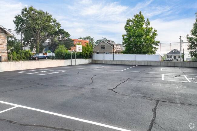 Shoot some hoops at recess at Lamb of God School in Baltimore.