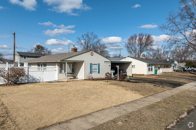 Visitors to Oaktree Hollow typically find rows of ranch homes on small lots close to the street.
