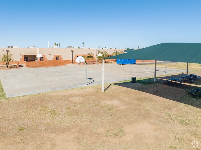 Students play basketball during recess at Southwest Leadership Academy