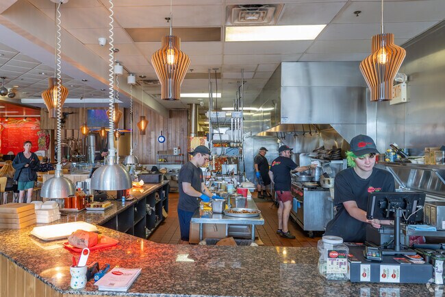 Mexitaly Brick oven Brewhouse in East York specializes in brick-oven pizzas and huge burritos.