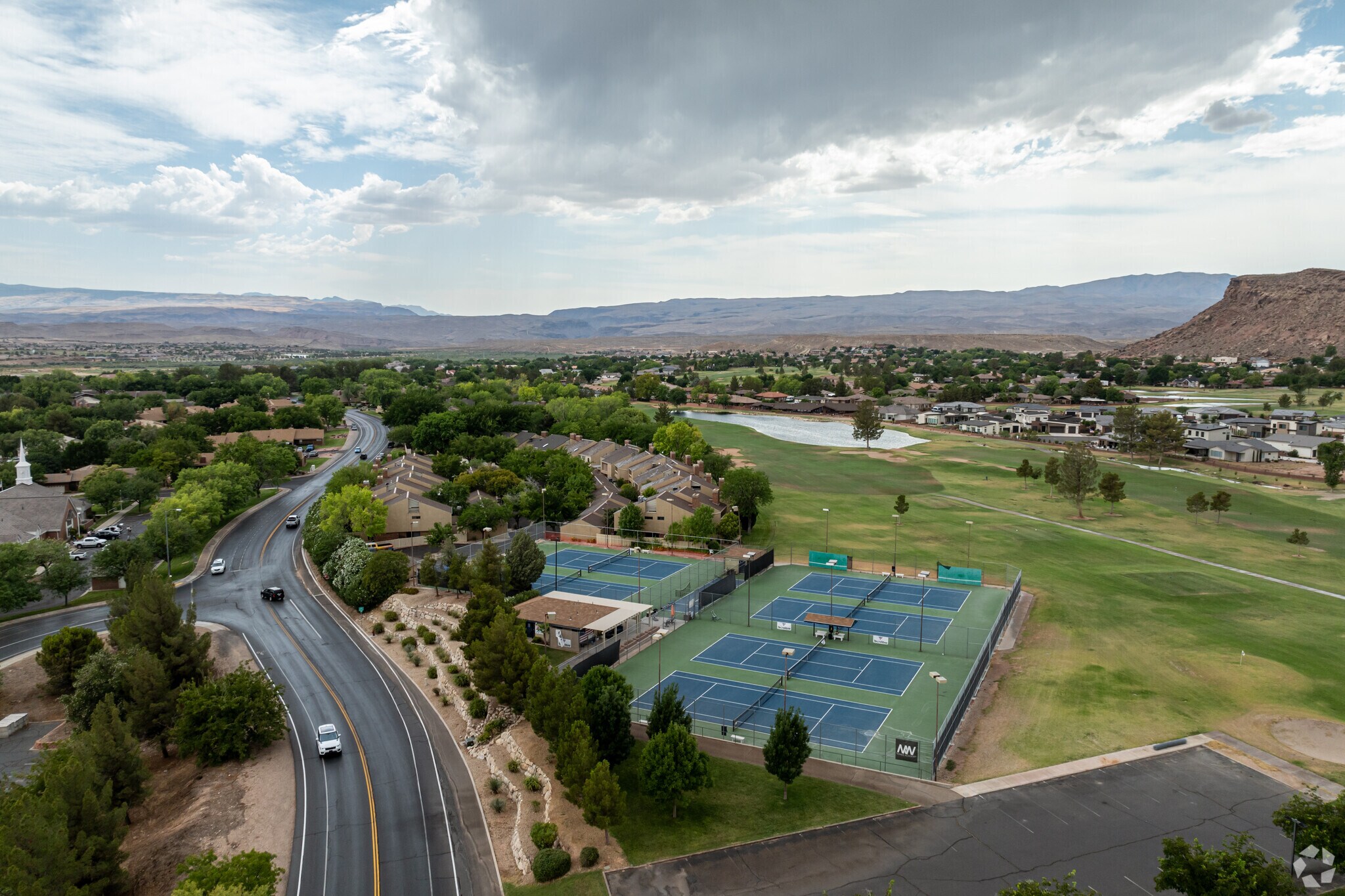 Several full-size tennis courts are perfect for a game of pickle ball in Bloomington County Club