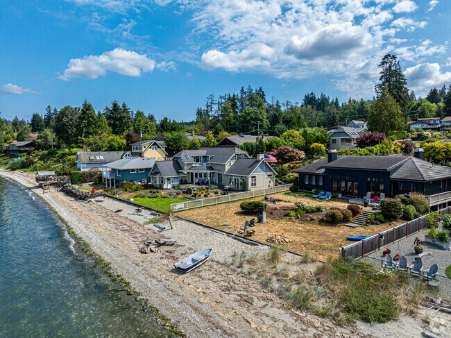 The beaches of the Lofall neighborhood are lined with million-dollar homes.