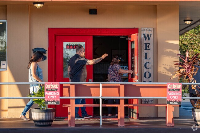 Smells of BBQ brisket fill Lee Blvd where Rib City sits, always drawing in a crowd.