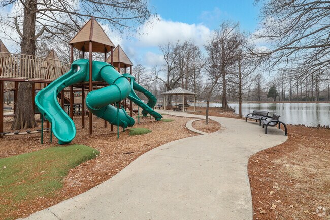 Parents have benches to relax while the kids play at Honor Heights Park.