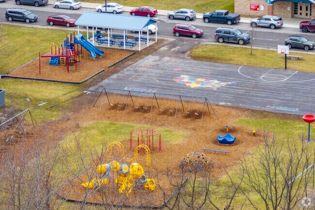 The playground at Brown Elementary School has colorful play structures for students to enjoy.
