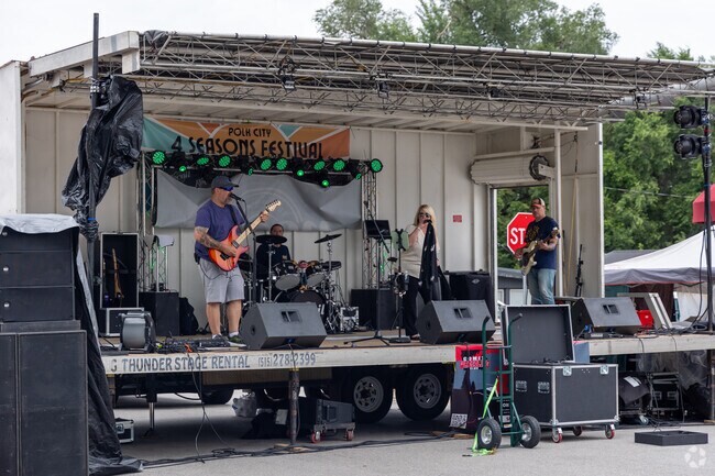 Live music at Polk City’s Four Seasons Festival creates a vibrant summer atmosphere.