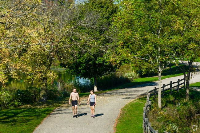 Two runners enjoying the trail in Lakewood Forest Preserve in Southeast Wauconda.