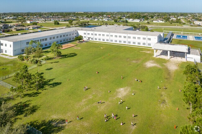 Patriot Elementary School in Cape Coral has a huge green space behind the school for PE & recess