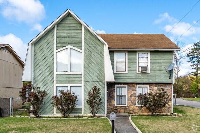A home with a gambrel style roof in the East Lake neighborhood.