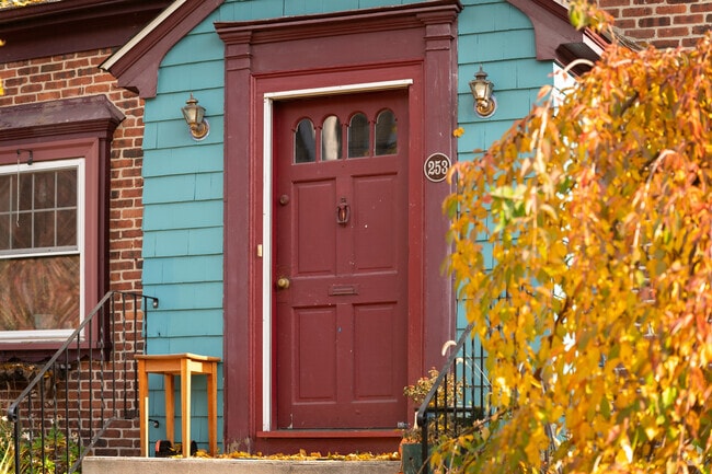 Hope cottage homes features a welcoming front door with vintage charm.