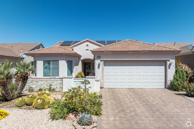 Homes in MacDonald Ranch are well-kept and feature desert landscaping.