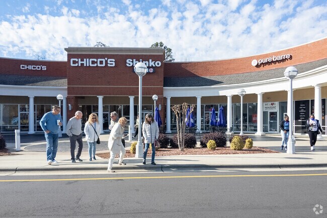 Oak Hollow Village features stores like Chico’s near Oak View.