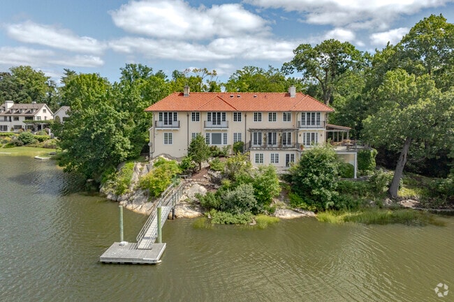 A stunning waterfront home perched along the rocks in Indian Field.