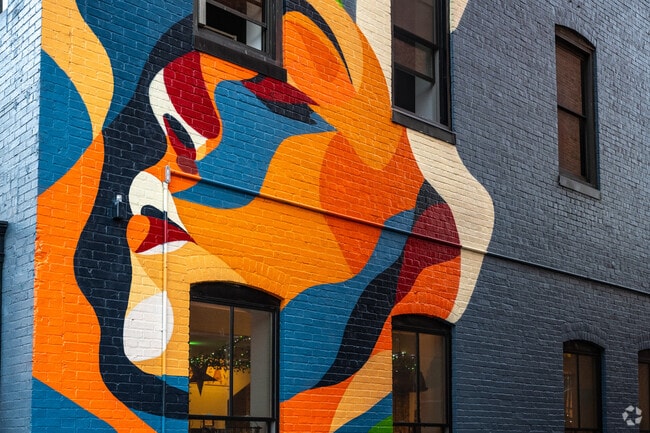 Admire the beautiful art that surrounds Johnson Pond.