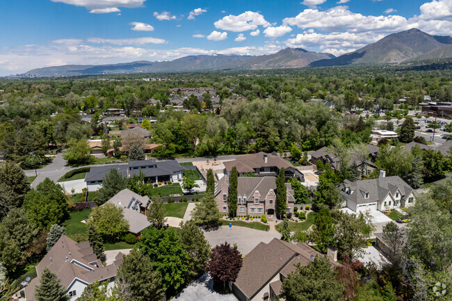 Holladay has mansions and large custom homes surrounded by mature trees.