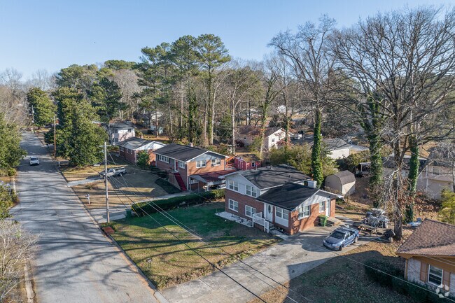 You'll find lots in Baker Hills with sculpted bushes and simple landscaping.
