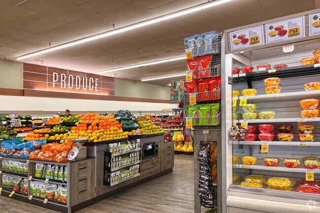 College West residents enjoy convenient shopping at Campus Plaza, home to Vons, popular eateries, and everyday essentials.