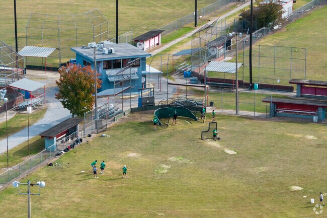 Athletes go to batting practice at the baseball fields in Neyland Park.