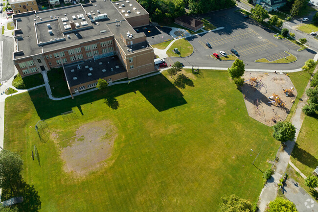 Frazer K 8 School adjoins Frazer Park to provide students with open greenspace areas.