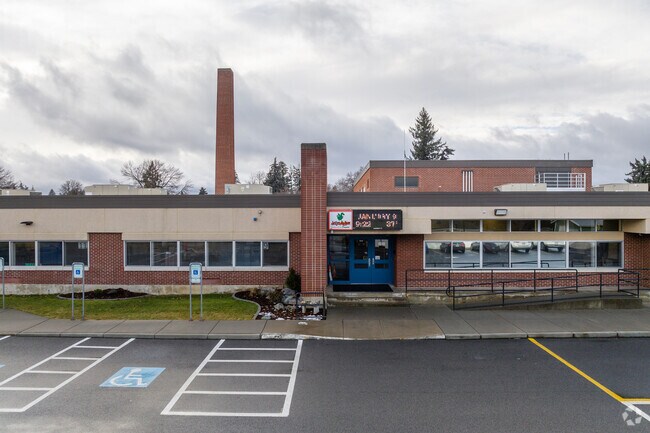 Ness Elementary features a large brick building for its students.
