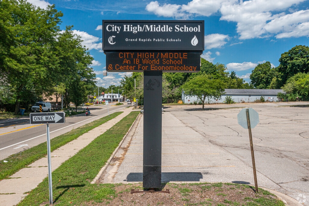 The City High/Middle School signage sits near the parking lot of the school in Creston, MI.
