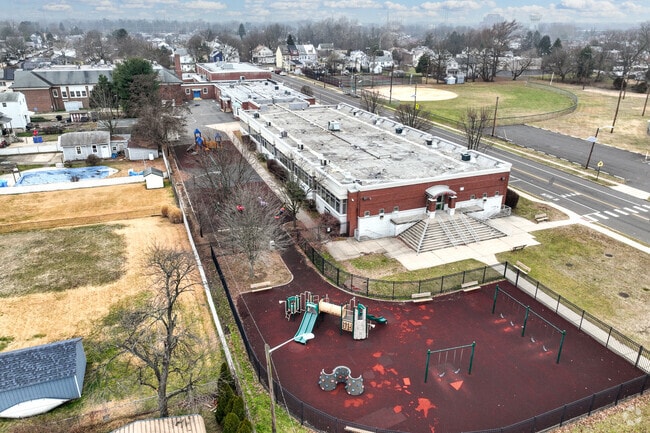 Aerial view of Samuel Smith Elementary School showing the fenced in area for recess.