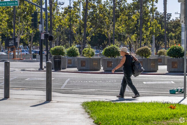 Arena Green Park features tennis courts and spacious green lawns.