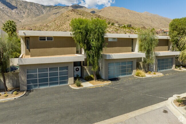 Enjoy bright interiors and desert landscaping from your condo in Canyon Corridor, Palm Springs.