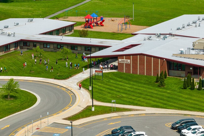 Students gather at Chestnut Hill Elementary's main entrance for recess.