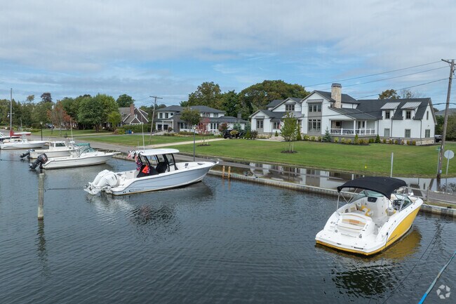 The most coveted lots in Brightwaters are waterfront properties with boat slips.