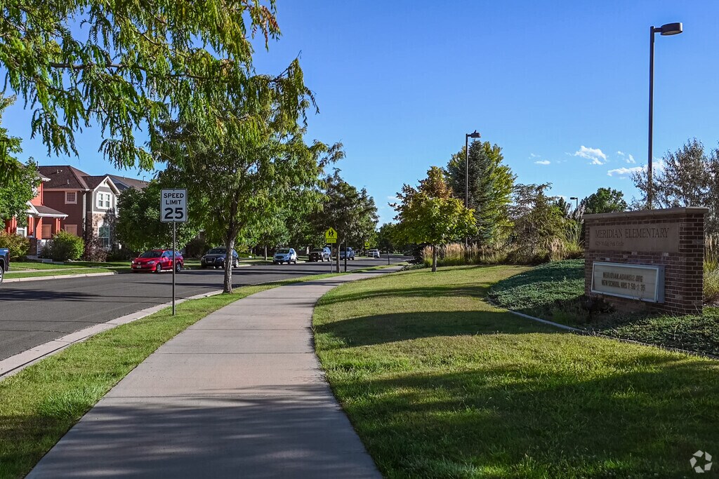 The sidewalk approaching Meridian Elementary School in Broomfield, Colorado.