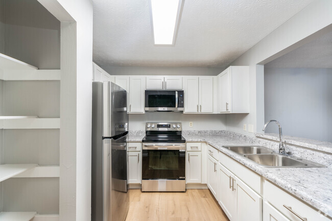 4BR, 2BA - 1266SF - Kitchen