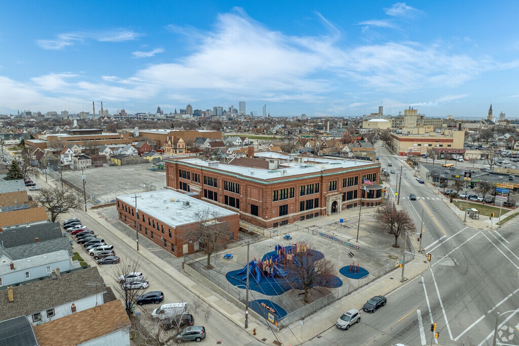 An aerial view of Forest Home Elementary School with downtown Milwaukee in the background.