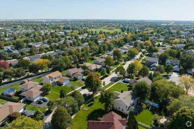 Hickory Oaks has large, landscaped yards along tree-lined streets.
