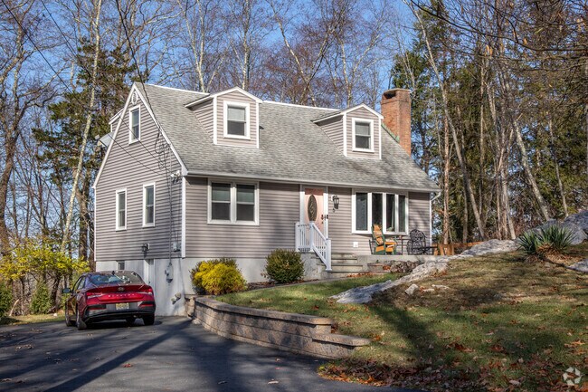 Green Township Cape Cod homes, surrounded by trees, are ideal for family living.