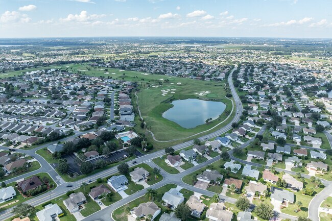 Aerial views of the Village of Amelia showcase the neighborhood's proximity to amenities.