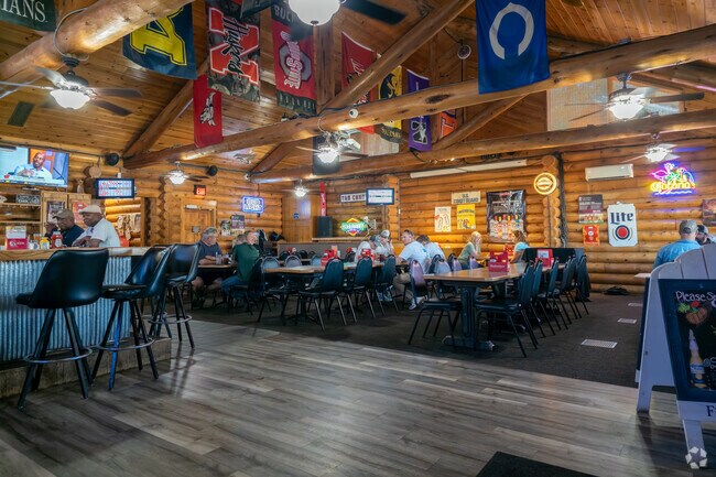 The Cabin Bar & Grill near Raven Oaks serves lunch and dinner in a relaxed setting.