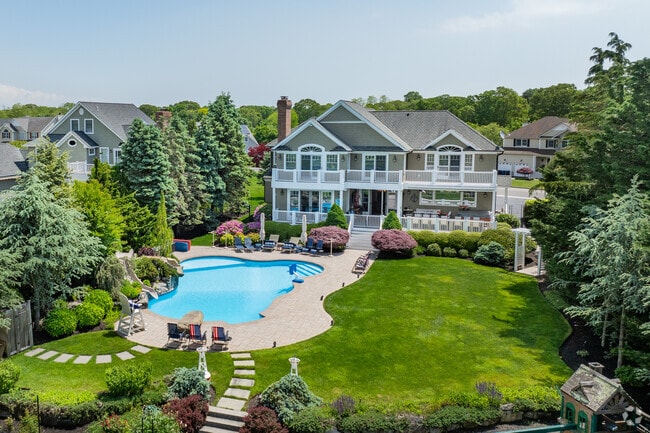Gorgeous backyard on this Colonial style home in Moriches.