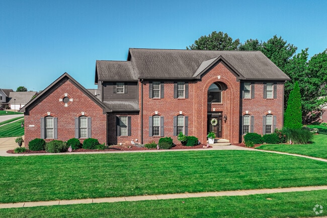 A stately brick home greets residents in one of Westbrooks newest developments.