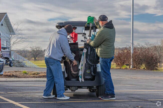 Cottage Grove residents get ready for a morning session of golf.