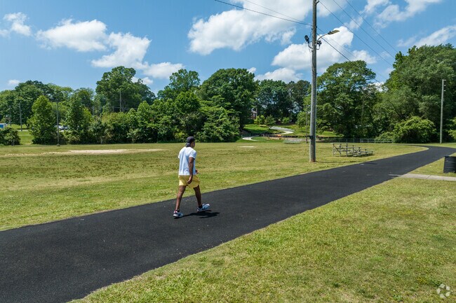 Walking trails and paved paths at Larry Bell Park invite residents to stay active and enjoy the outdoors.