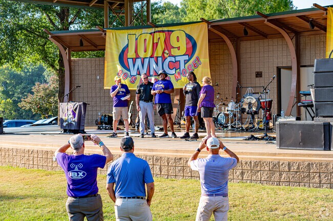 ECU football players greet the crowd at Concert On The Common.