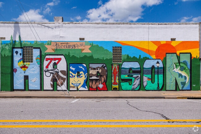 A colorful mural greets visitors to downtown Harrison.