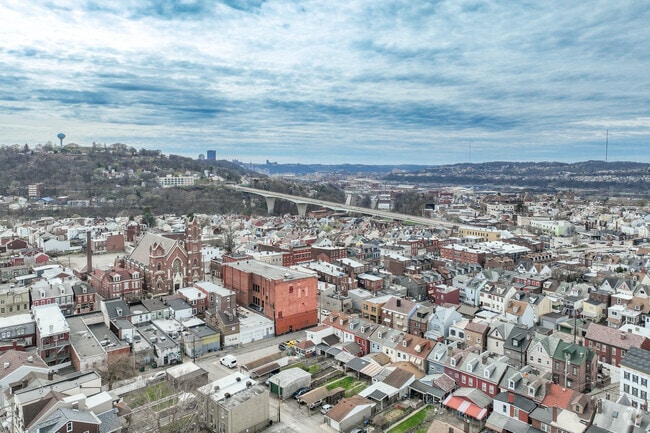An aerial shot of Bloomfield facing toward Downtown Pittsburgh.