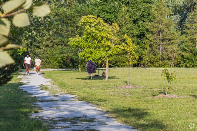 Thompson Park’s nine acres of greenspace includes a basketball court in Popular Grove.